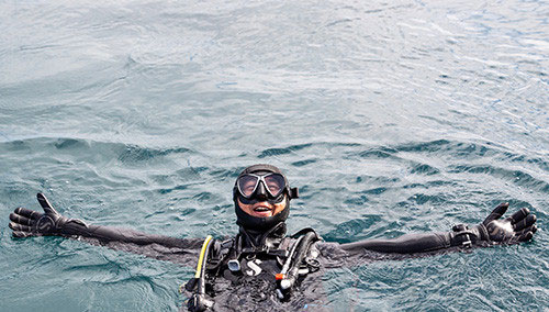 Diver wearing Glide BCD doing back float	