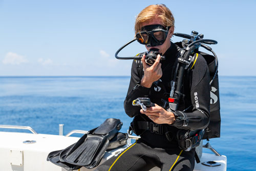 Diver on boat wearing the Hydros X BCD