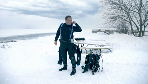 Man in the snow with SCUBAPRO gear