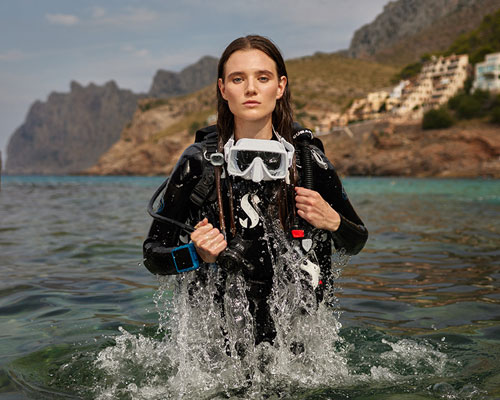 Woman diver coming out of the water