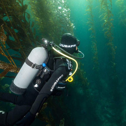 Underwater diver with easy to spot bright yellow super-flow hose