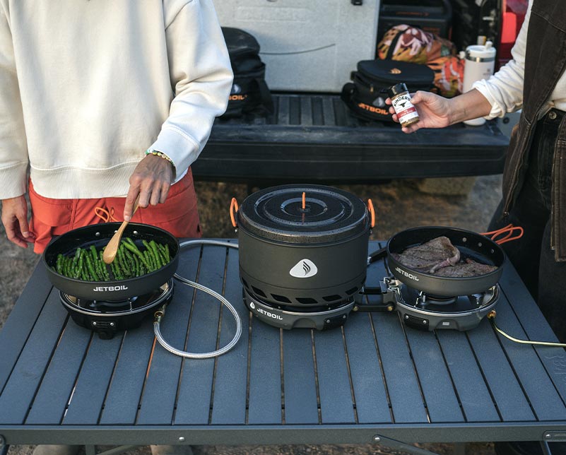 Jetboil HalfGen Cooking Stove connected to Genesis Basecamp System