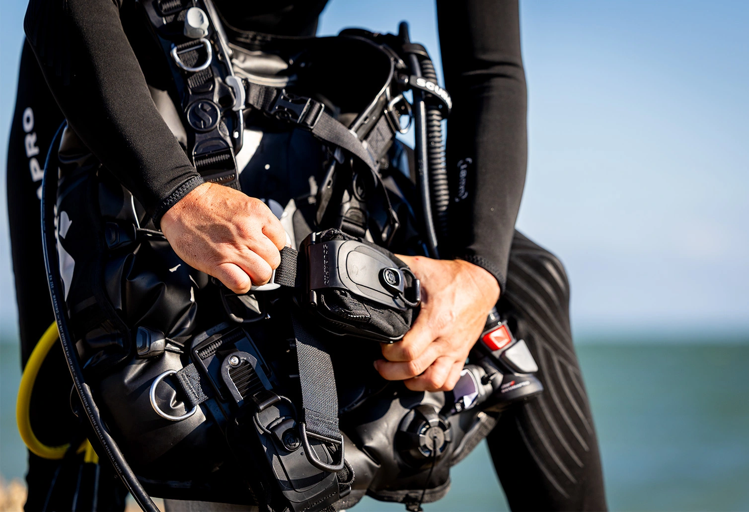 Close-up of the SCUBAPRO Hydros Pro 2 modular buoyancy compensator system with removable and adjustable components.