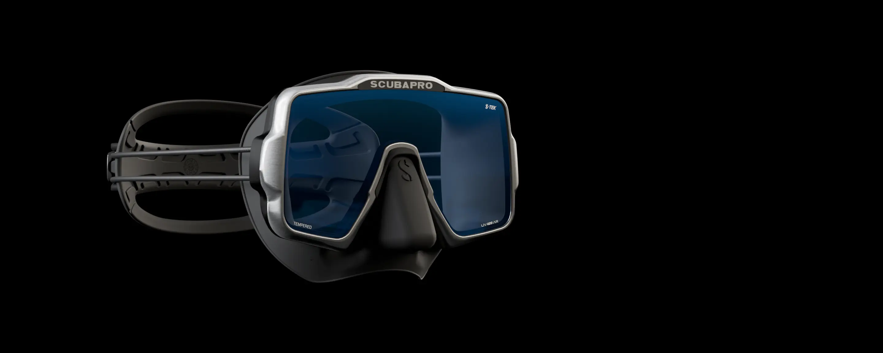 Black dive mask with blue-tinted lenses on a black background.