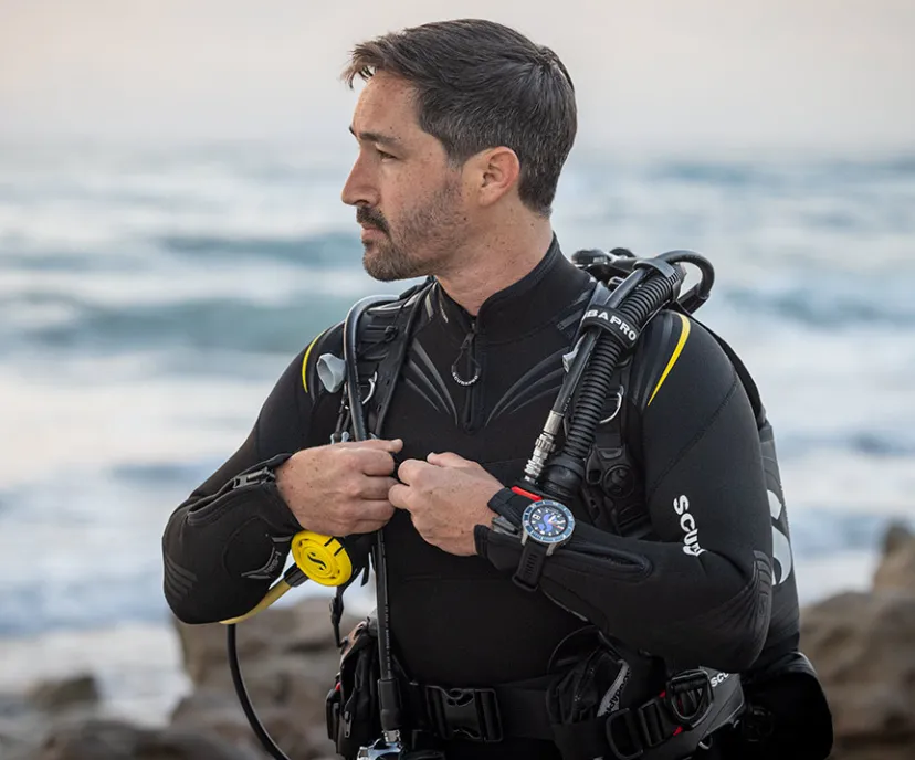 Scuba diving wearing Galileo 3 Titanium Diver Computer overlooking the ocean