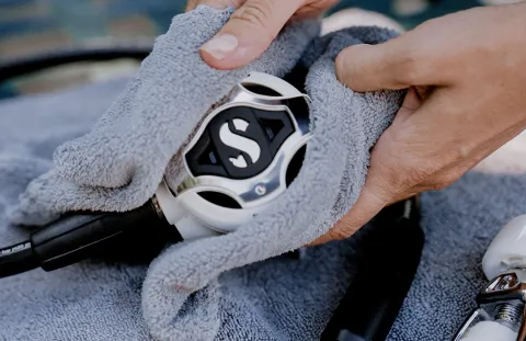 White scuba regulator wrap it in a soft cloth